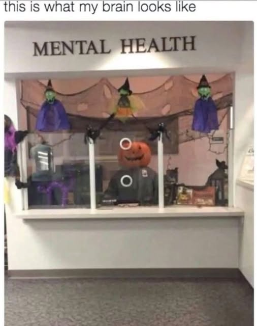 Mental health check in window all decorated for Halloween with the caption "this is what my brain looks like"